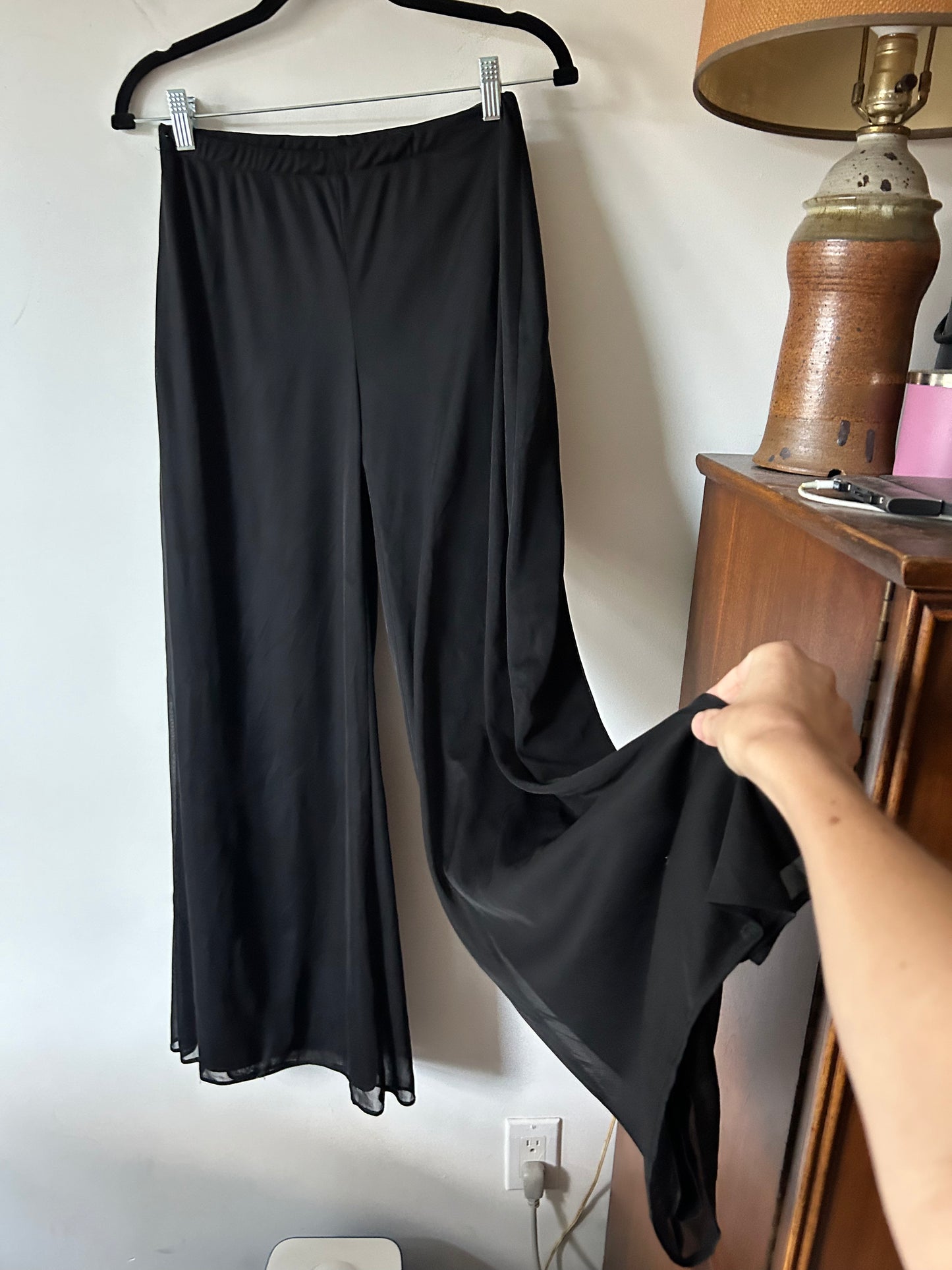 black trousers with sheer overlay