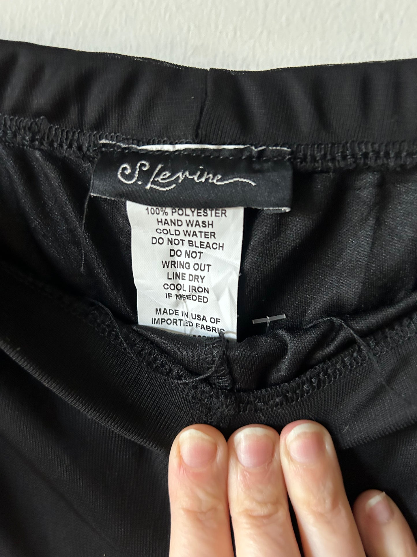 black trousers with sheer overlay