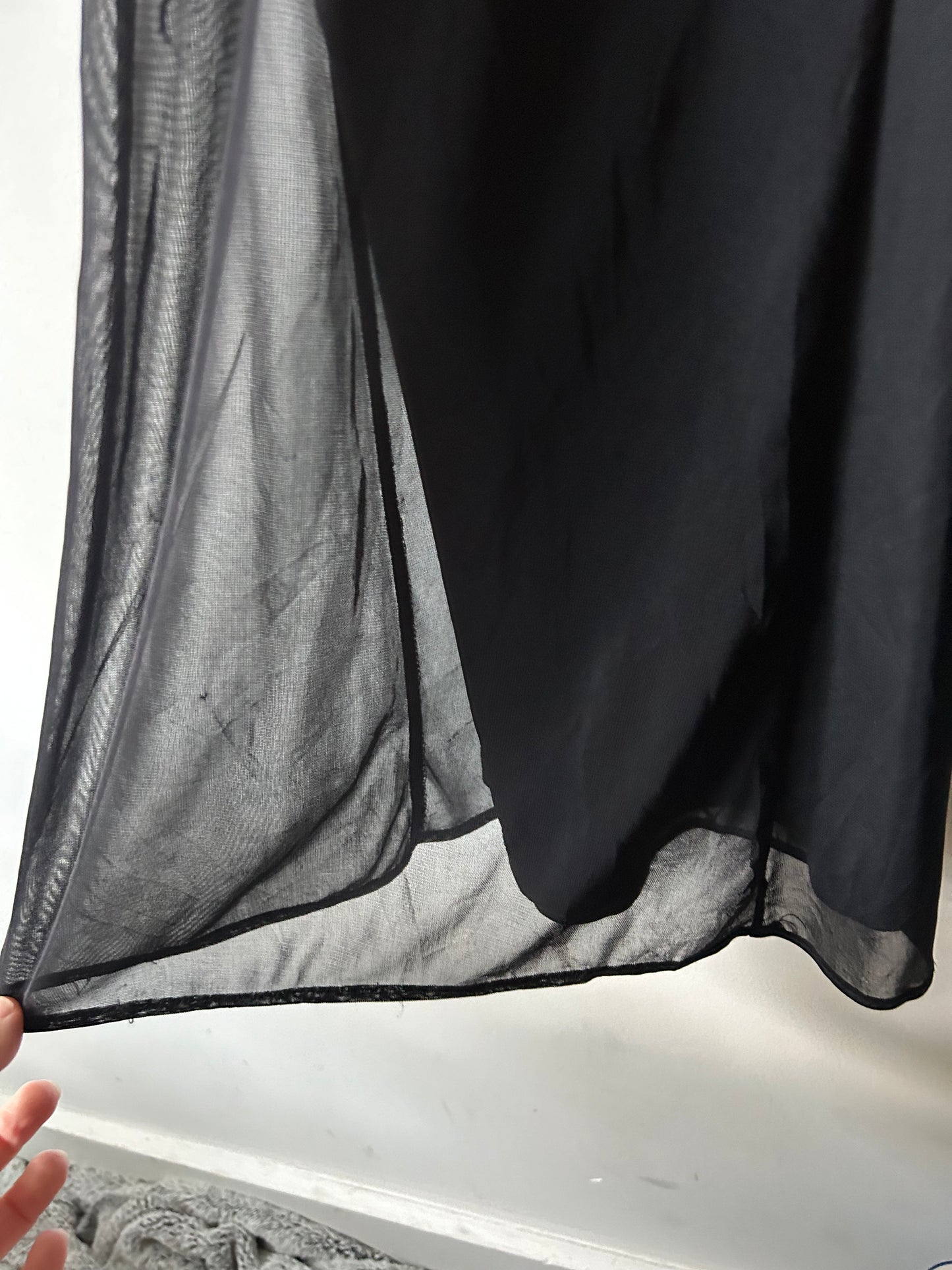 black trousers with sheer overlay